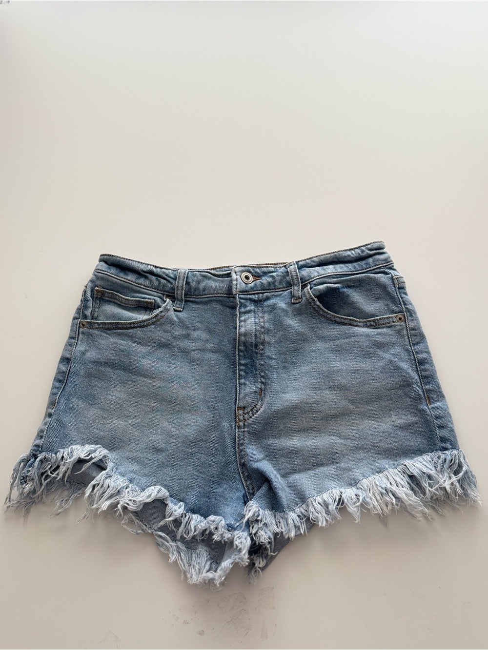Re  Generation Women’s Light Blue Frayed Hem Denim Shorts